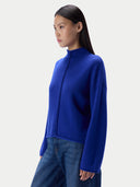 Kaschmirpullover mit Zopfgeflecht und Stehkragen