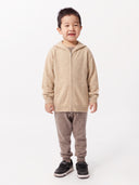 Kind trägt: Unisex nahtlose Kapuzenjacke mit Reißverschluss in Beige, Vorderansicht